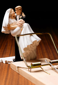 Wedding couple in a mouse trapGetty images