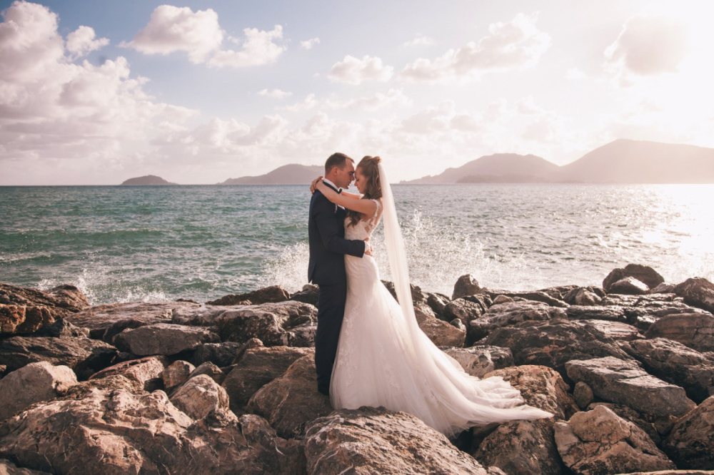 Bride and groom on the sea